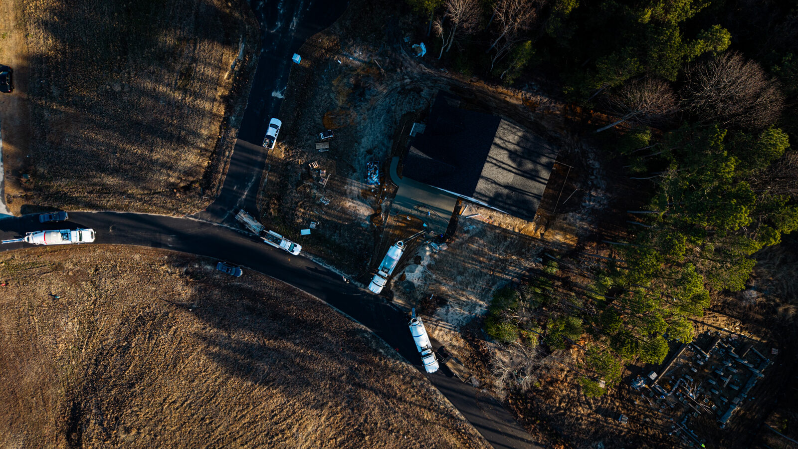 Drone view of SRM mixer truck navigating to job site in Eastern NC