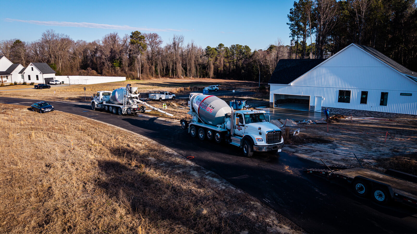 Drone shot of concrete pour in progress at residential development
