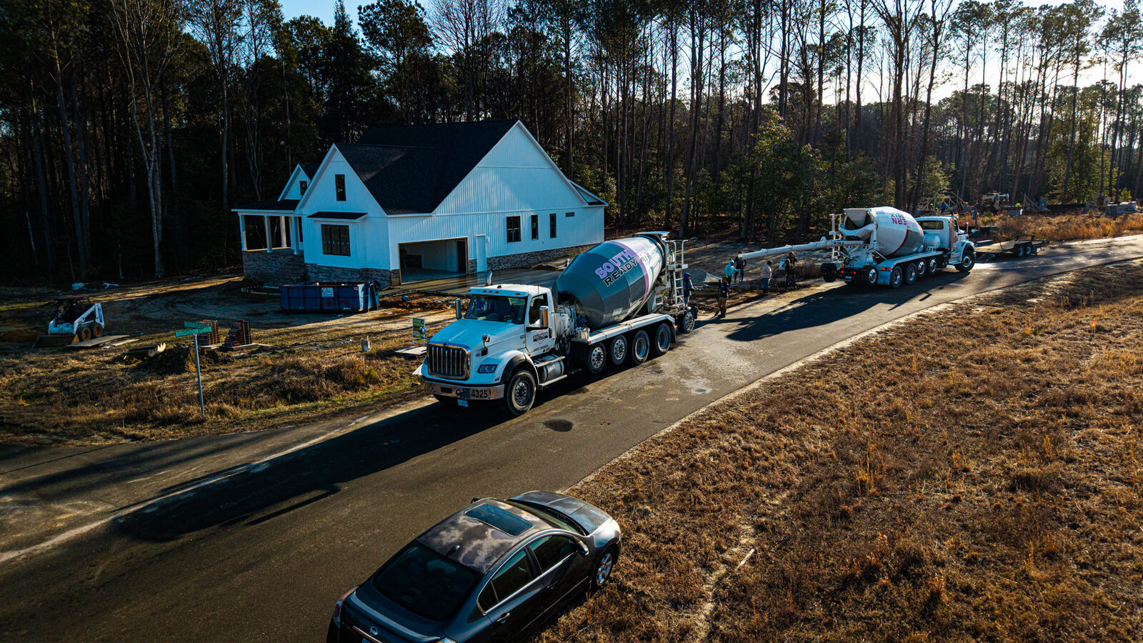 Aerial shot of SRM concrete delivery to new home construction site